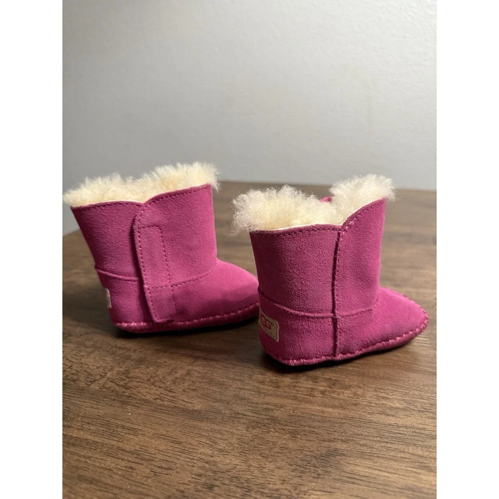 UGG‎ Caden baby booties in fuchsia pink suede with sheepskin lining 0/1